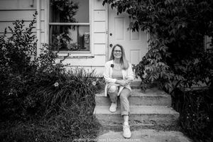 A black and white photo series showing a person walking up steps to a house entrance.