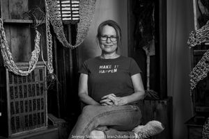 A black and white photo collage shows four different poses of a person against a dark background.