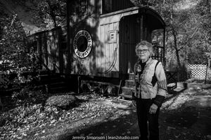 A black and white collage of garden scenes showing a path, barn structures, and natural landscaping elements.