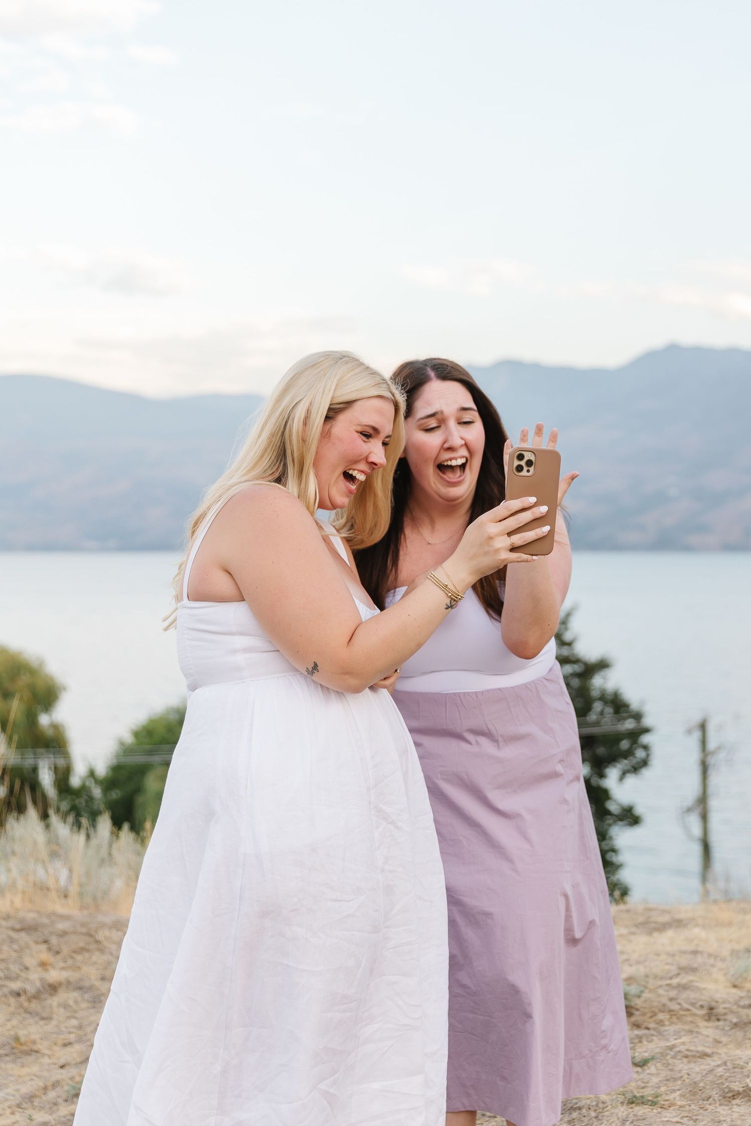 Reaction from a surprise proposal at Sanctuary Gardens in West Kelowna, BC during engagement photos.