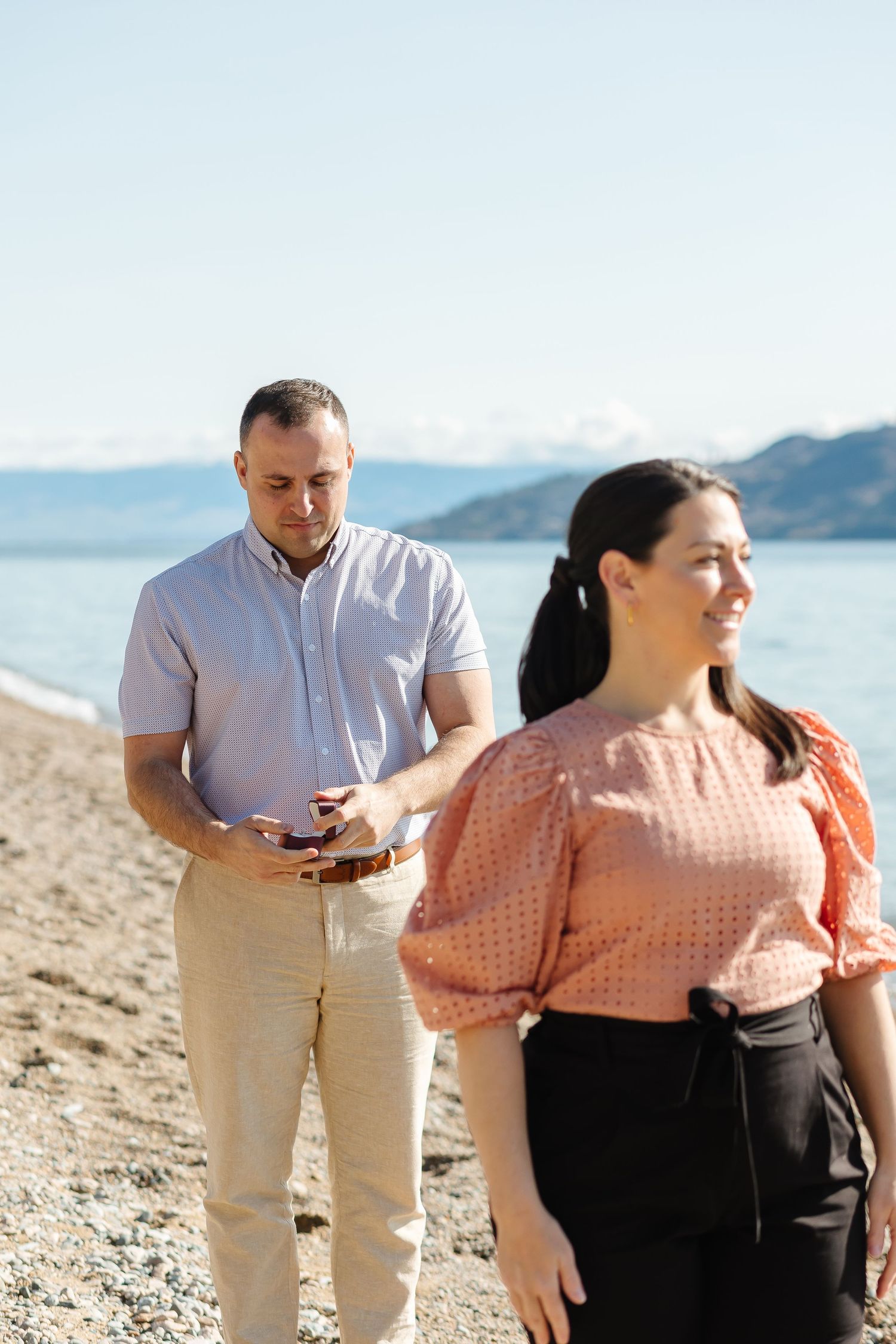 Surprise proposal photoshoot in Peachland, BC with view of Okanagan Lake in the background.
