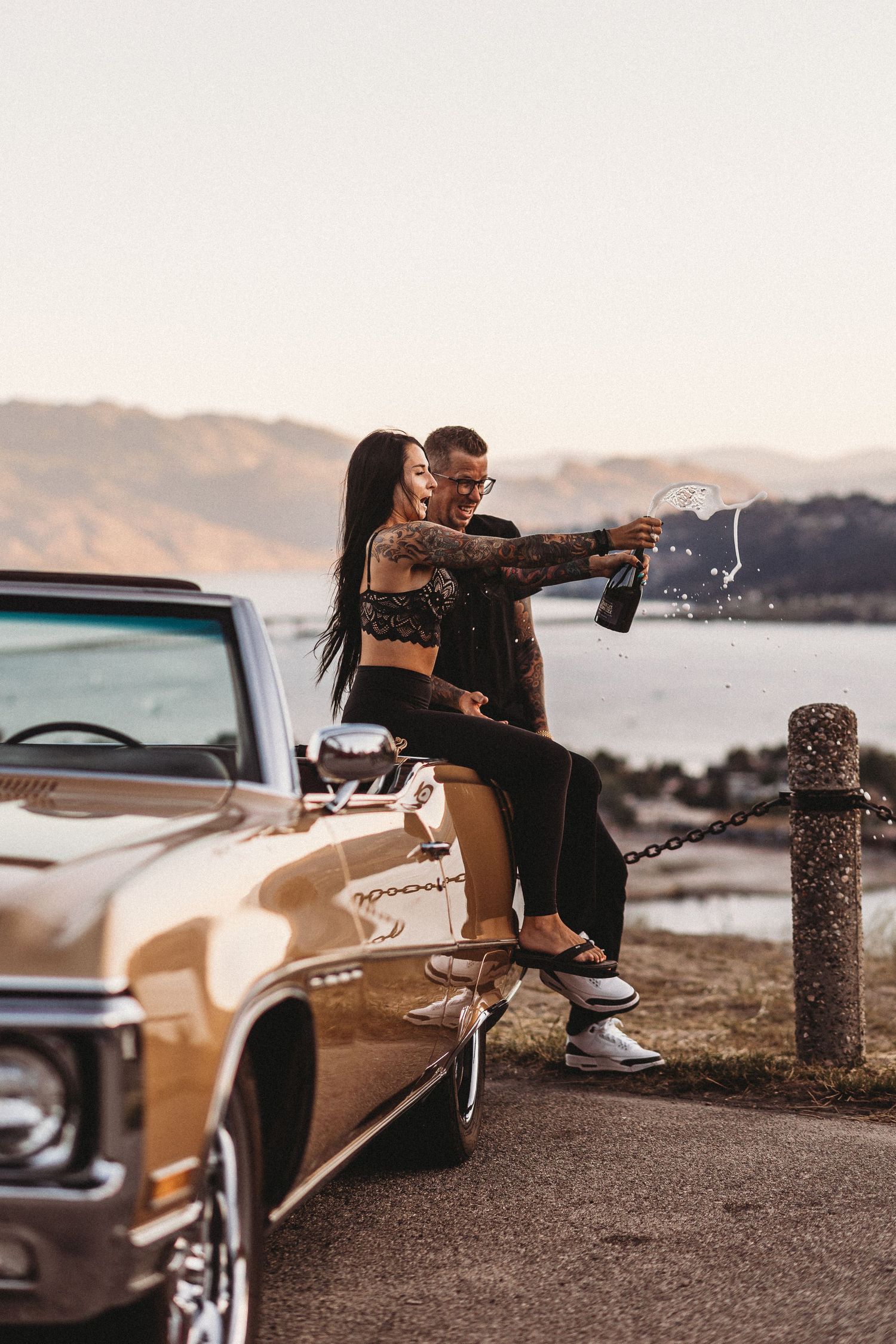couple celebrating their engagement at sunset for a photo session in Kelowna bc