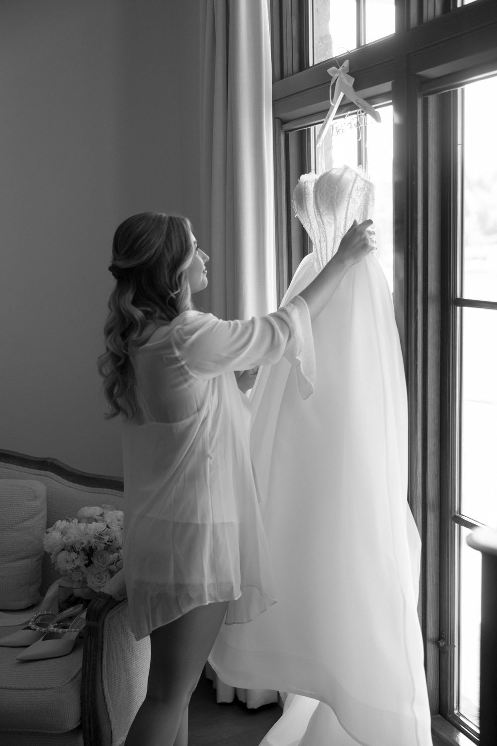 Artistic sequence showing preparation with white flowing fabric against bright windows.