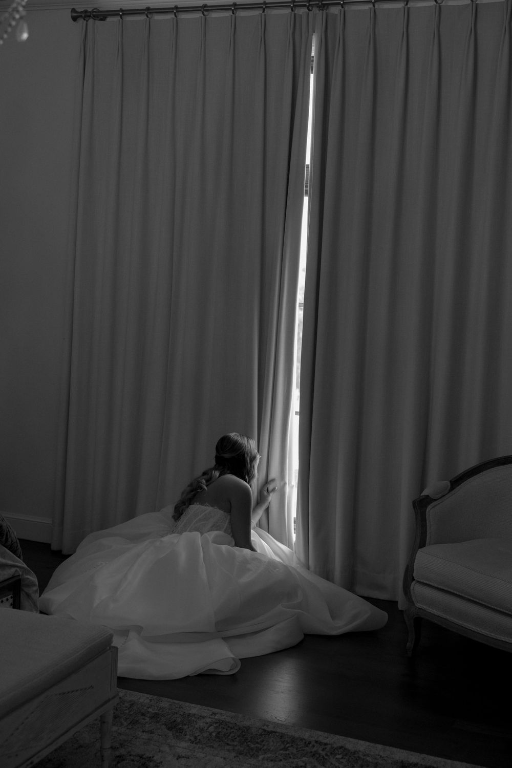 Dramatic black and white photos showing silhouettes against window light with flowing curtains.