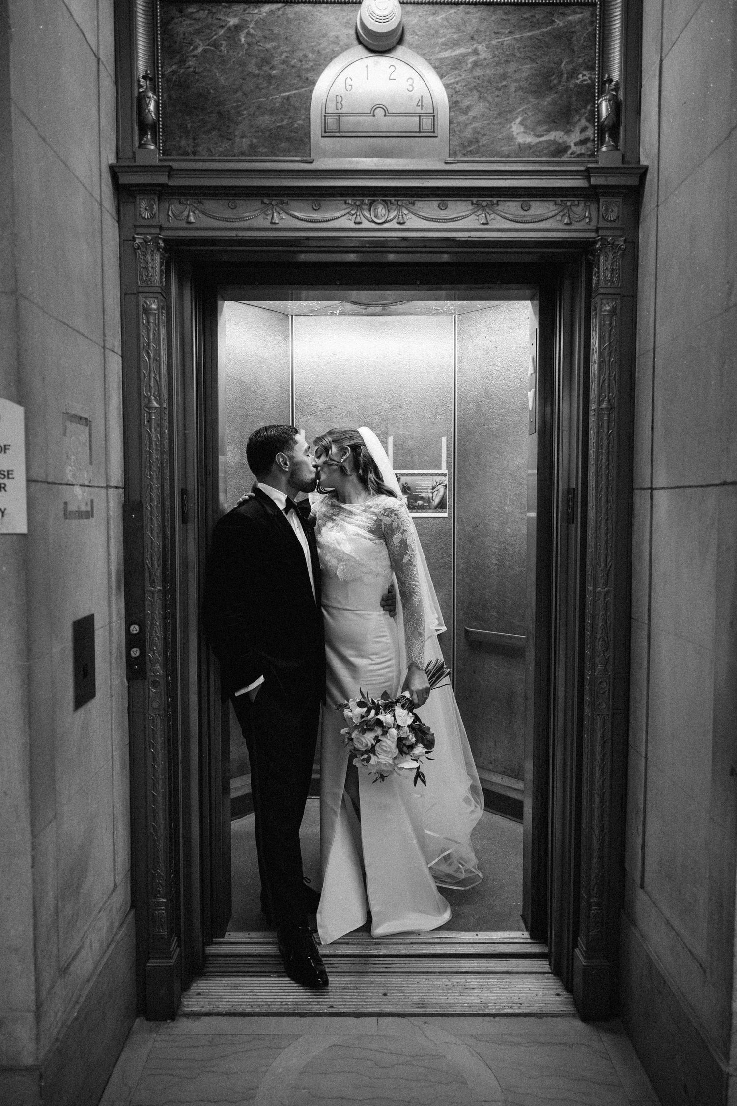 Black and white wedding photos showing couples in elegant doorways of a classic building interior.