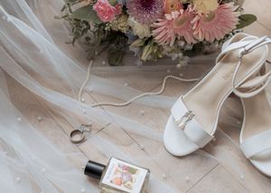 Light and airy candid wedding moments captured in Moncton NB.
Elegant wedding detail shot with bouquet in Moncton New Brunswick.