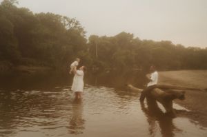 A series of sepia-toned photographs showing people enjoying leisure activities on a lake during sunset.