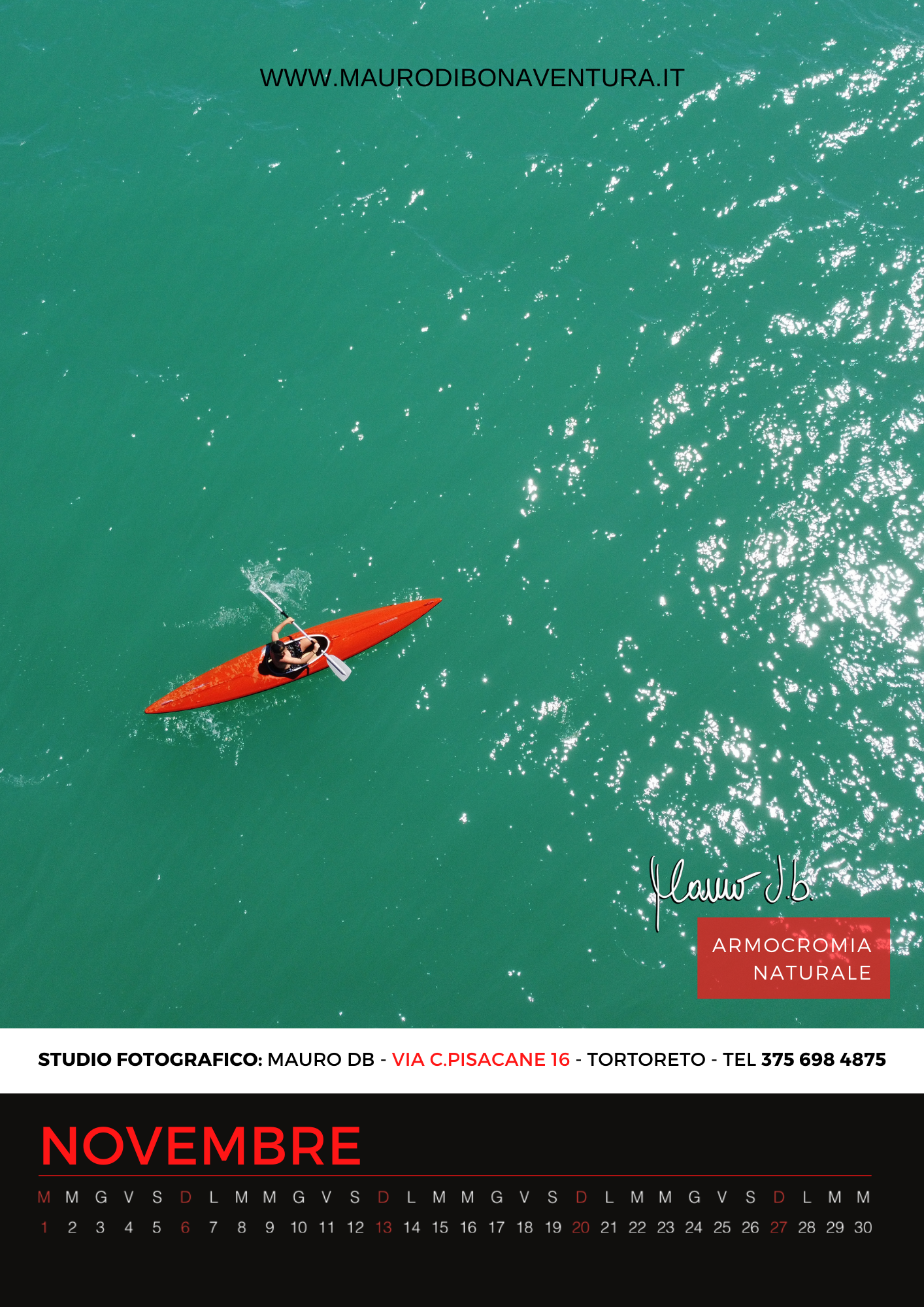 Aerial view of red kayak in turquoise waters for November calendar page.