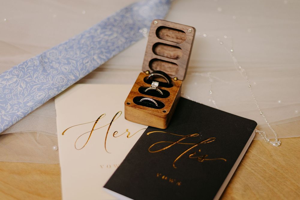 Wooden letterpress blocks arranged to spell out text on a light-colored surface.