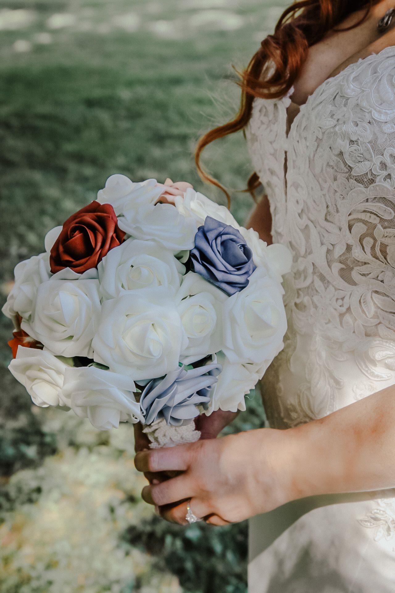 Wedding , bride holding flowers