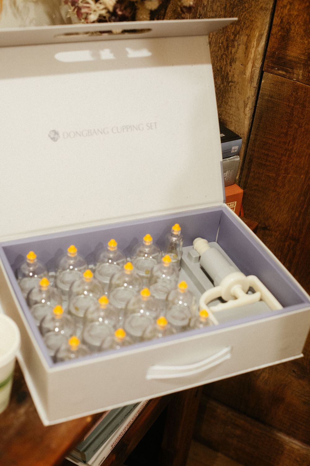 Detail image of a set of cupping tools taken in the studio of an acupuncture small business in the West End of Portland, Maine.