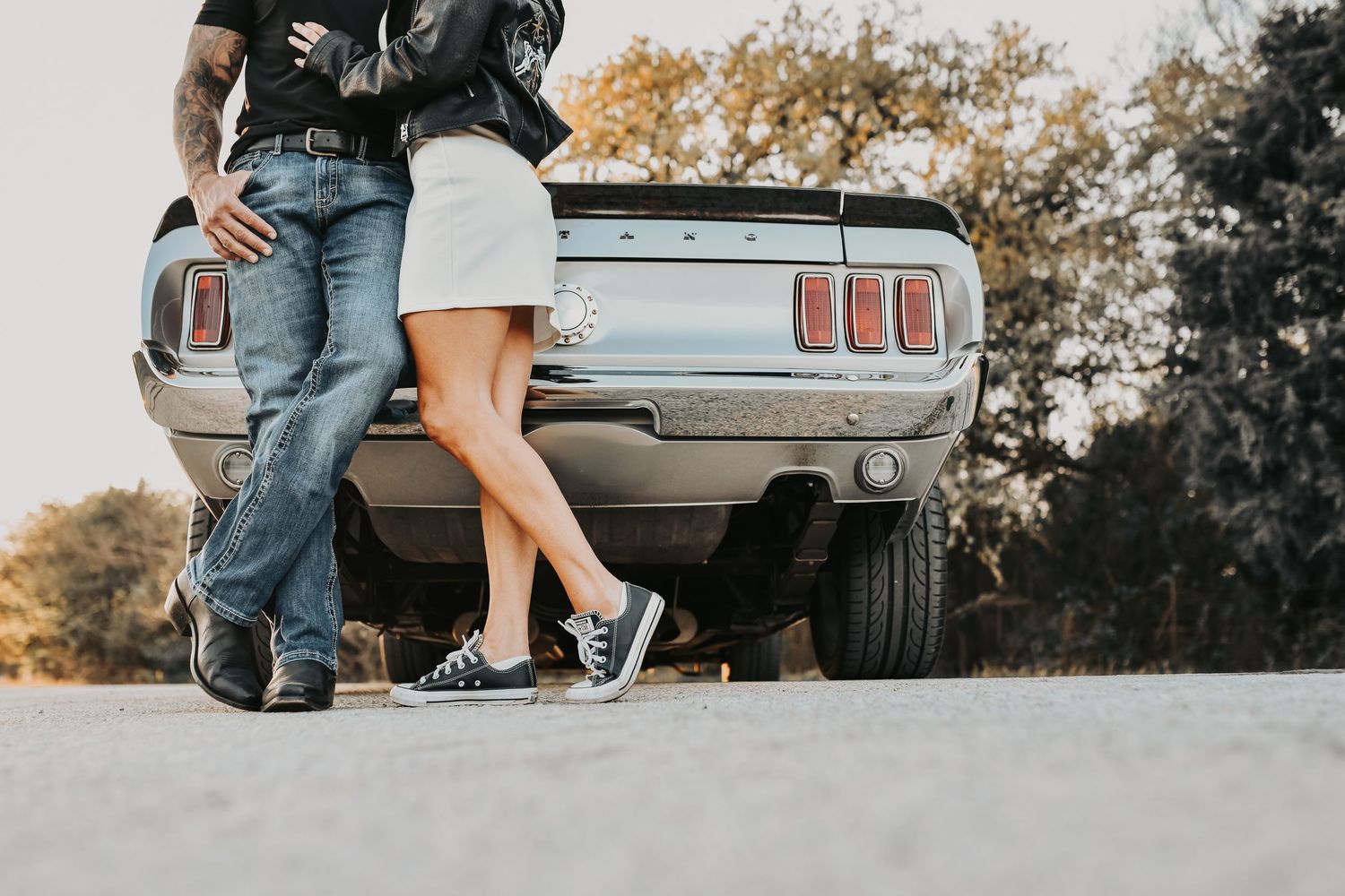 retro car engagement photos with edgy editorial couple styling