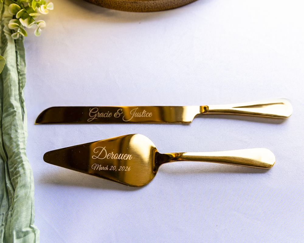 Gold engraved wedding cake cutting set personalized with Gracie and Justice Derouen, March 26, 2024.
