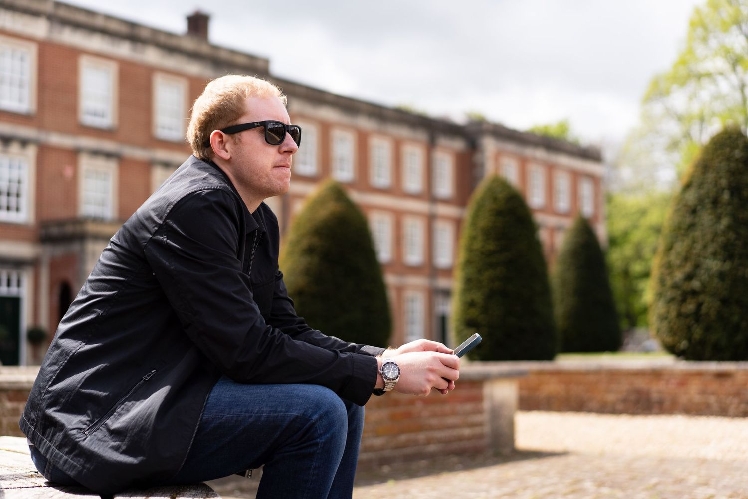 Consultant takes a moment during a branding photoshoot at the barracks in Winchester.