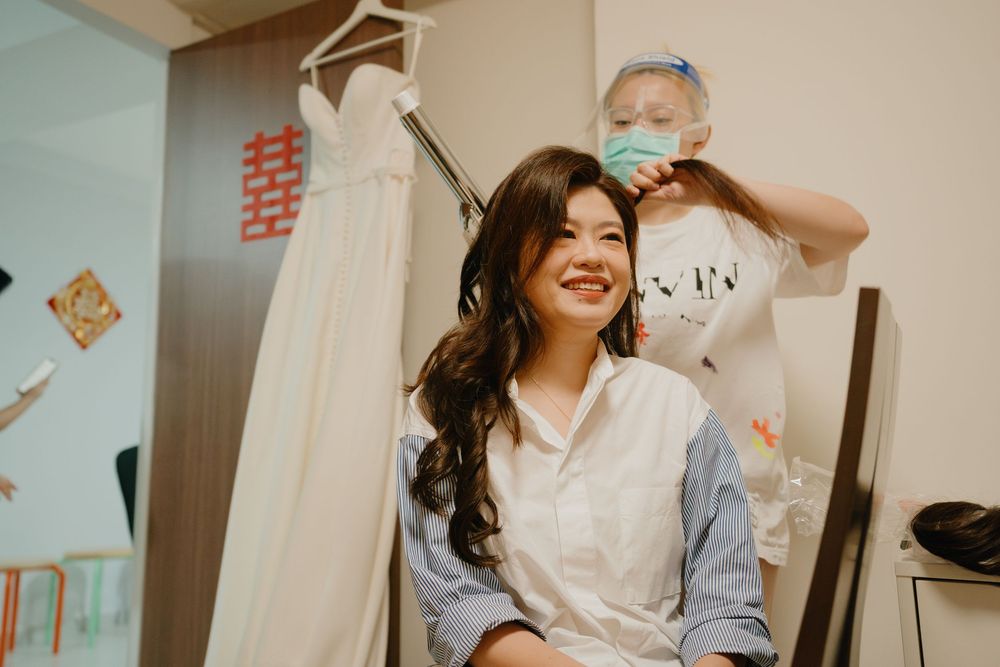 A series of photos showing healthcare workers in PPE masks having a light-hearted moment in a medical setting.