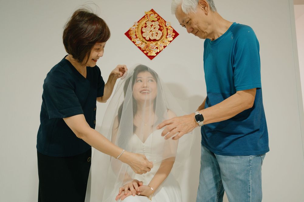 Medical practitioner demonstrating therapeutic treatment techniques on a patient in a clinical setting.