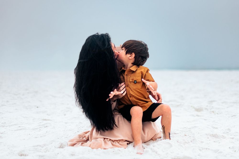 Affordable Family photography services near me in Miramar Beach Florida. Kid friendly photographer captures natural moments on the beach