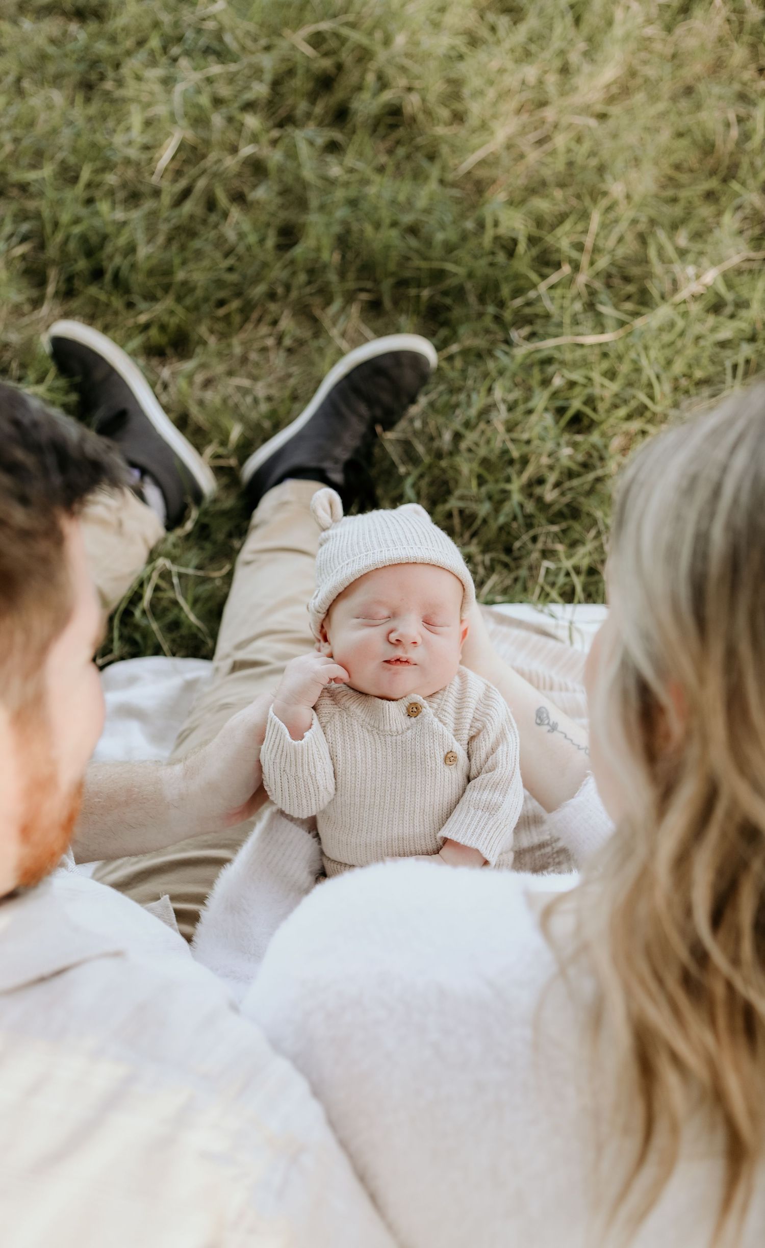 Newborn posing during a newborn lifestyle session
