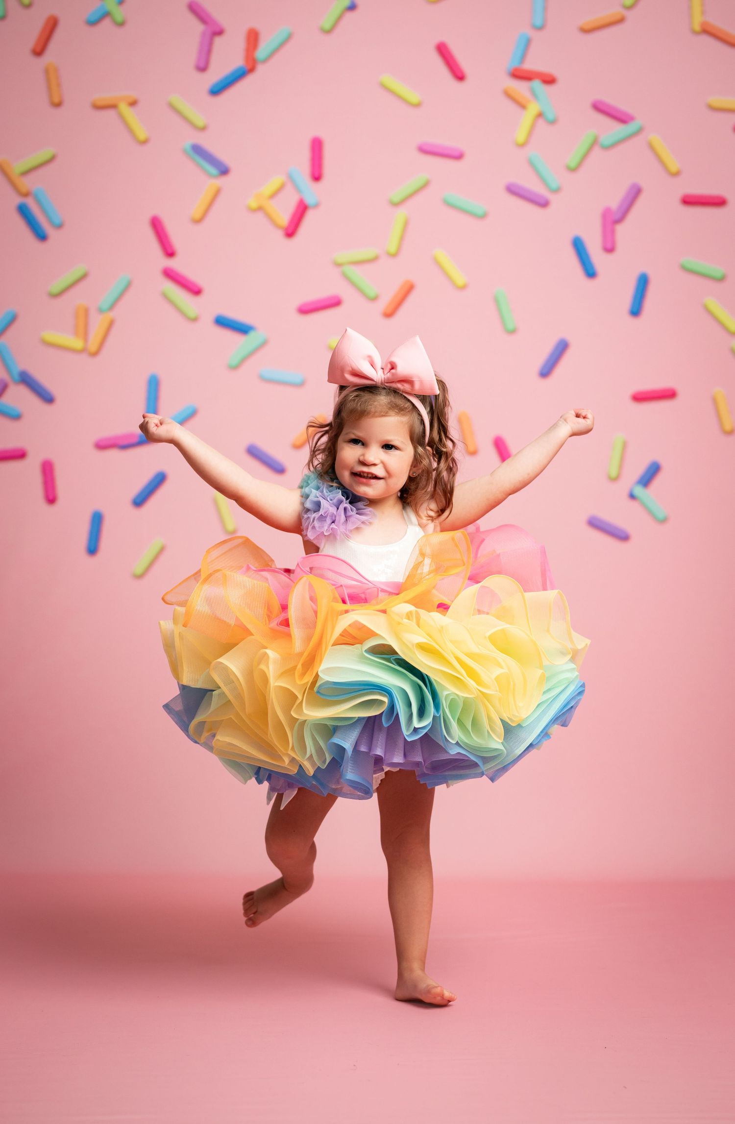 Simple coming soon text announcement displayed in dark text against a bright white illuminated background.