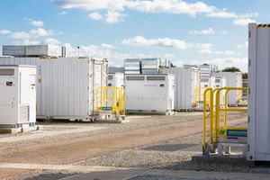 Site engineer in full PPE working on an ABB grid connection at a renewable energy facility -3
