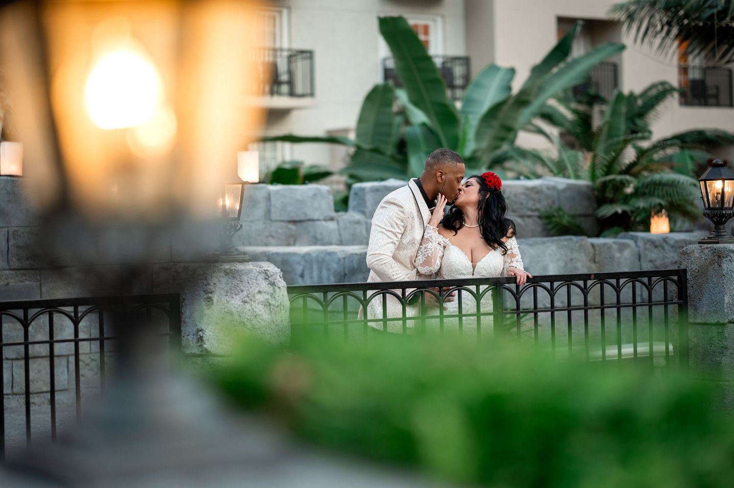 The groom kisses his bride captured by Wellington Luxury wedding photographers, the best wedding photographers in Wellington.