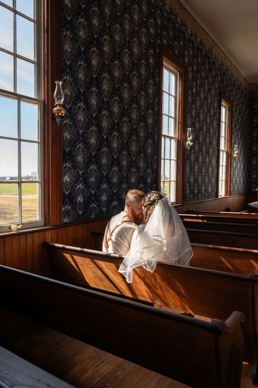 Elegant outdoor wedding ceremony in Indiana with bride and groom exchanging vows