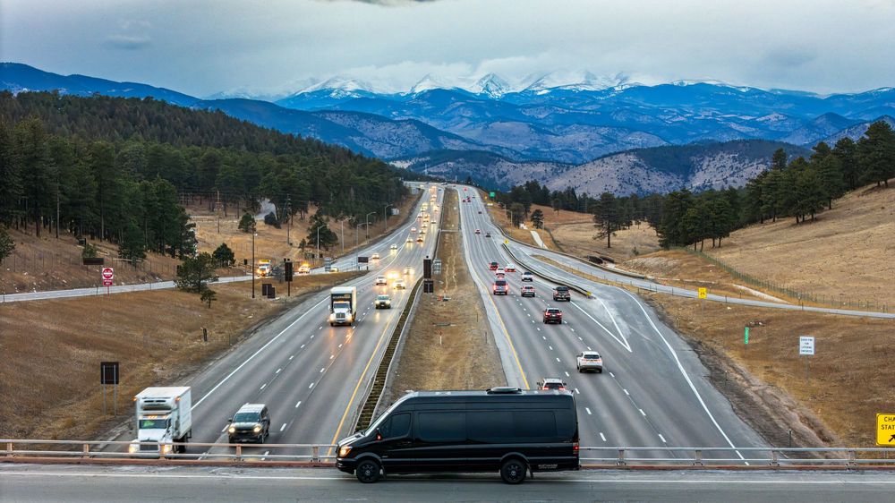Aerial shot of the Ski Lift Limo on a mountain bridge by Denver Hospitality, Travel & Tourism photographer Captain Colorado Photography.