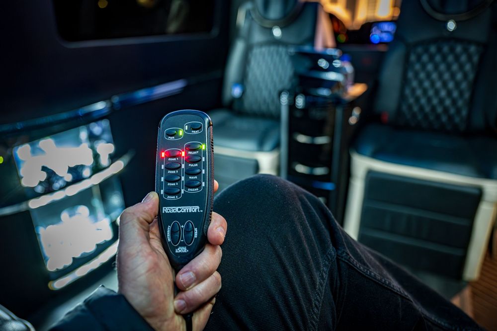 Shot of the massage chair remote in the Ski Lift Limo by Denver Hospitality, Travel & Tourism photographer Captain Colorado Photography.