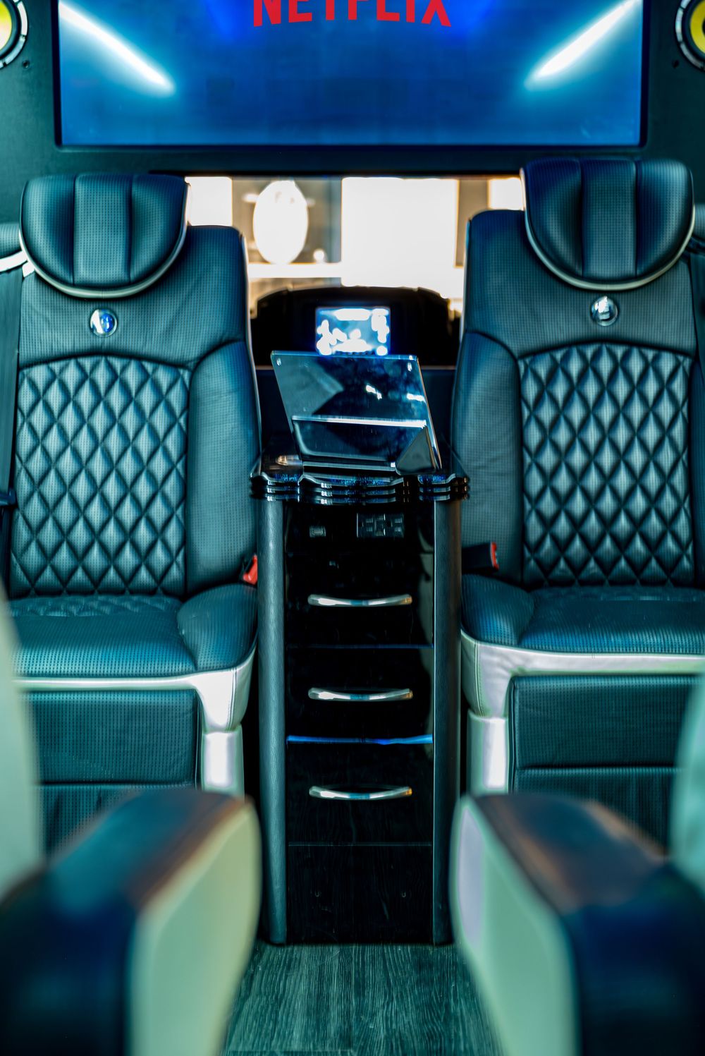 Shot of the luxurious seating in the Ski Lift Limo by Denver Hospitality, Travel & Tourism photographer Captain Colorado Photography.