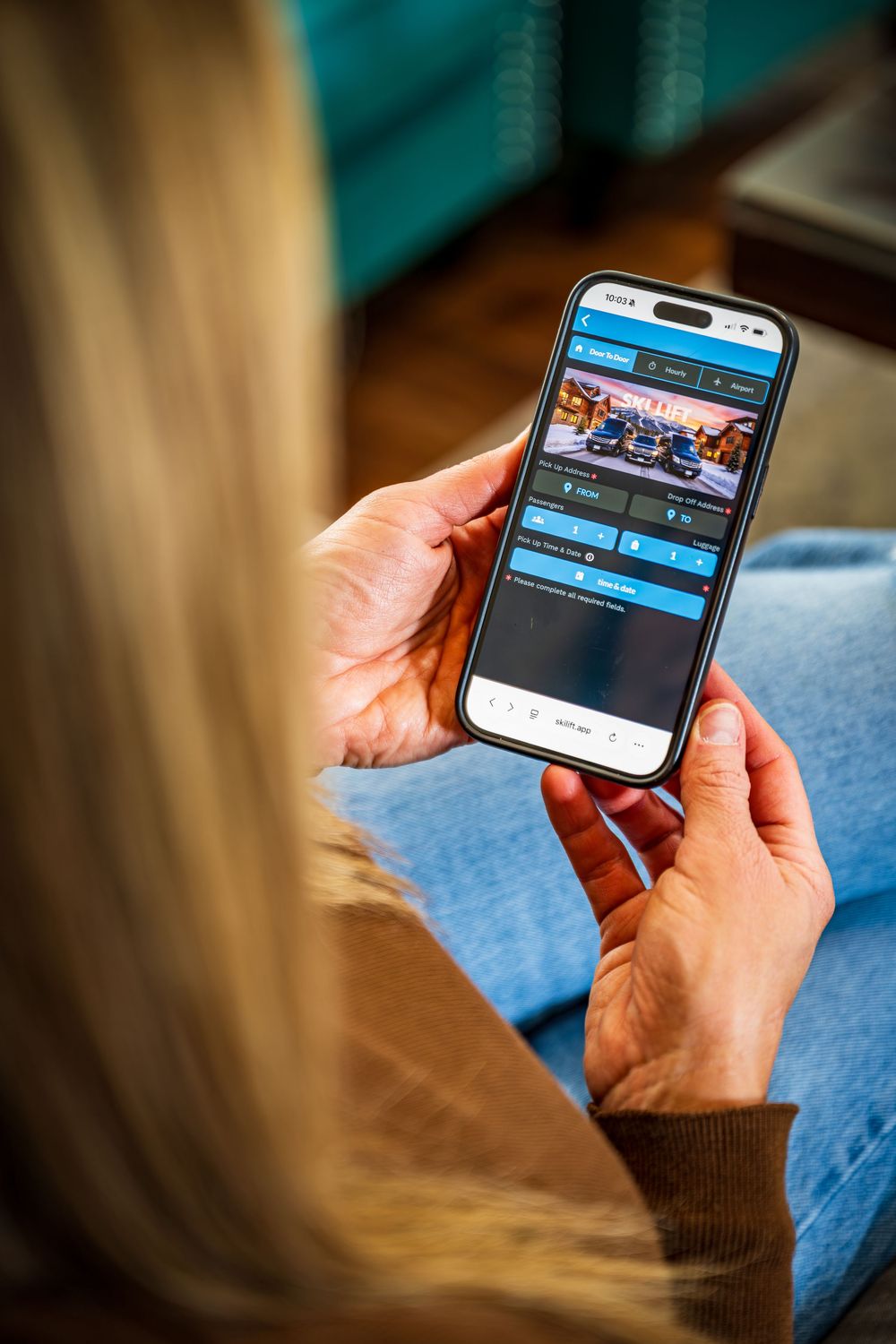 Shot of a customer using the Ski Lift Limo app to book by Denver Hospitality, Travel & Tourism photographer Captain Colorado Photography.