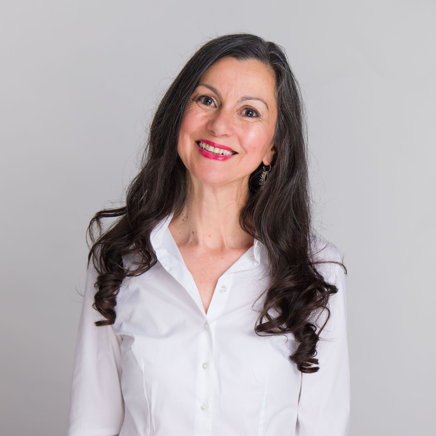 Professional studio headshot on plain background-01
