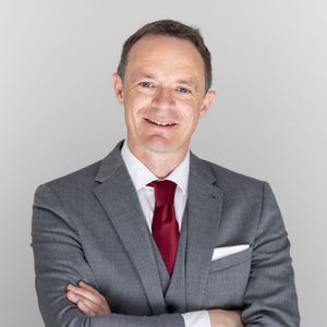 Professional studio headshot on plain background-04