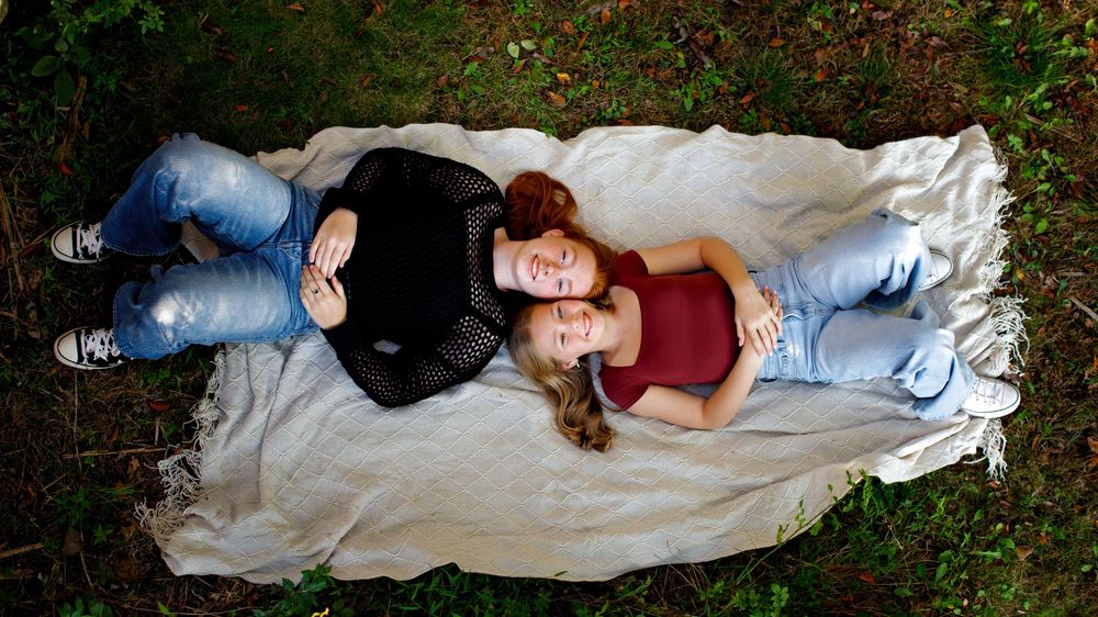 Best Photographer Bergen County NJ sisters on blanket