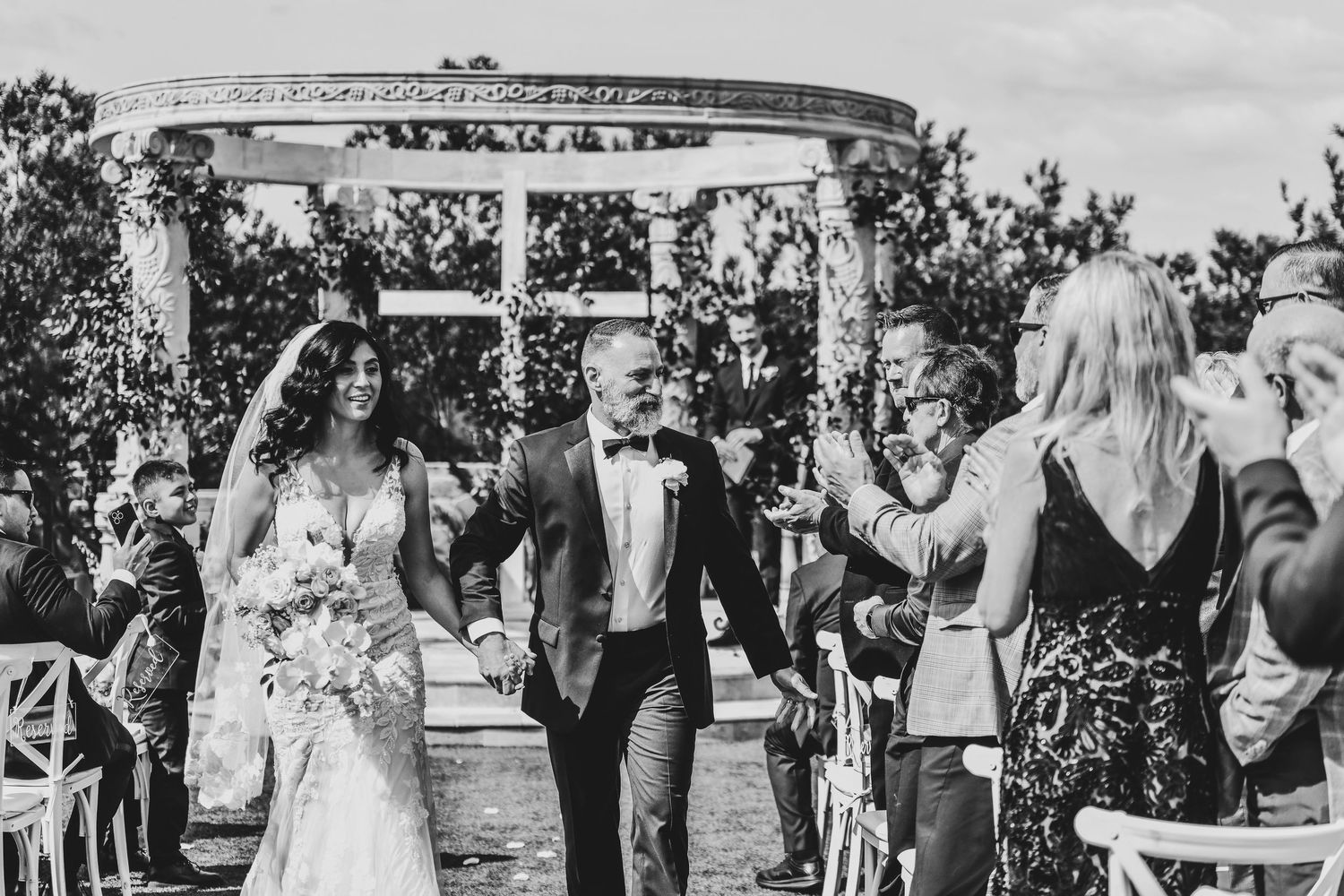Bride and groom exchanging vows in McKinney Texas