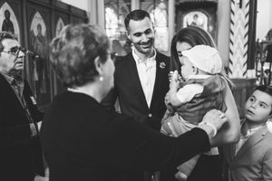 Black and white wedding photo collage showing candid moments of celebration and dancing at a reception.