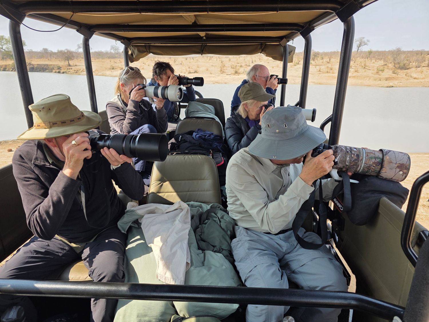 Photographers in a Open Safari Vehicle (OSV)