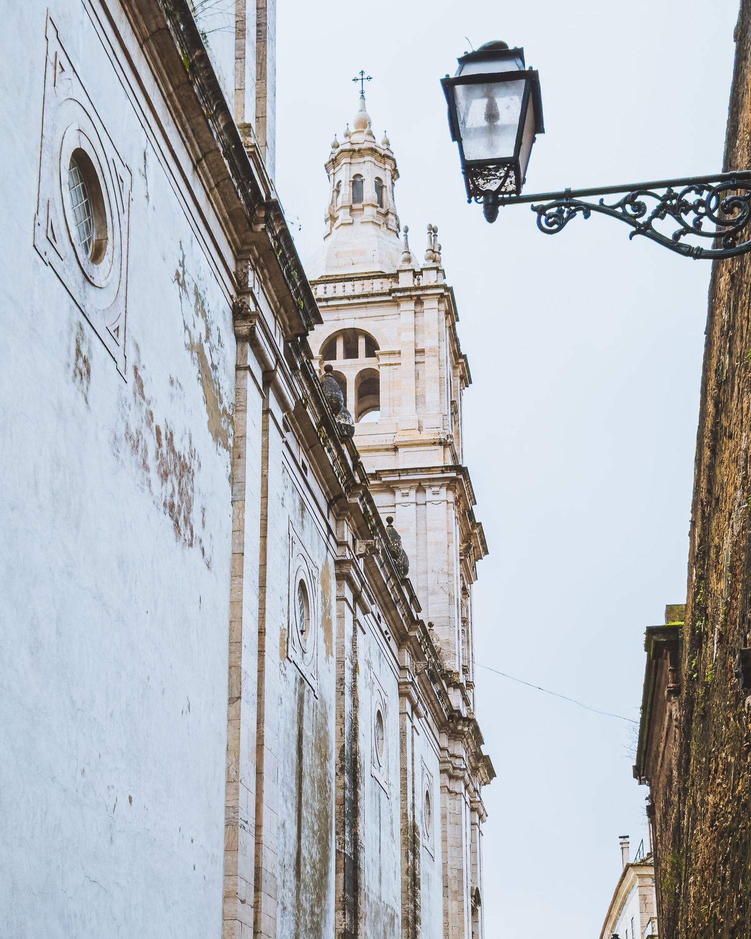 White church towers and ornate architecture in traditional Portuguese style.