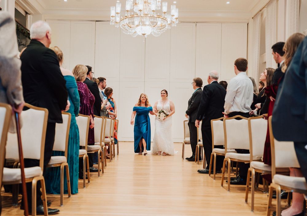 Yorktowne Hotel wedding in York, PA– bride making entrance to wedding ceremony in east ballroom – elegant winter wedding