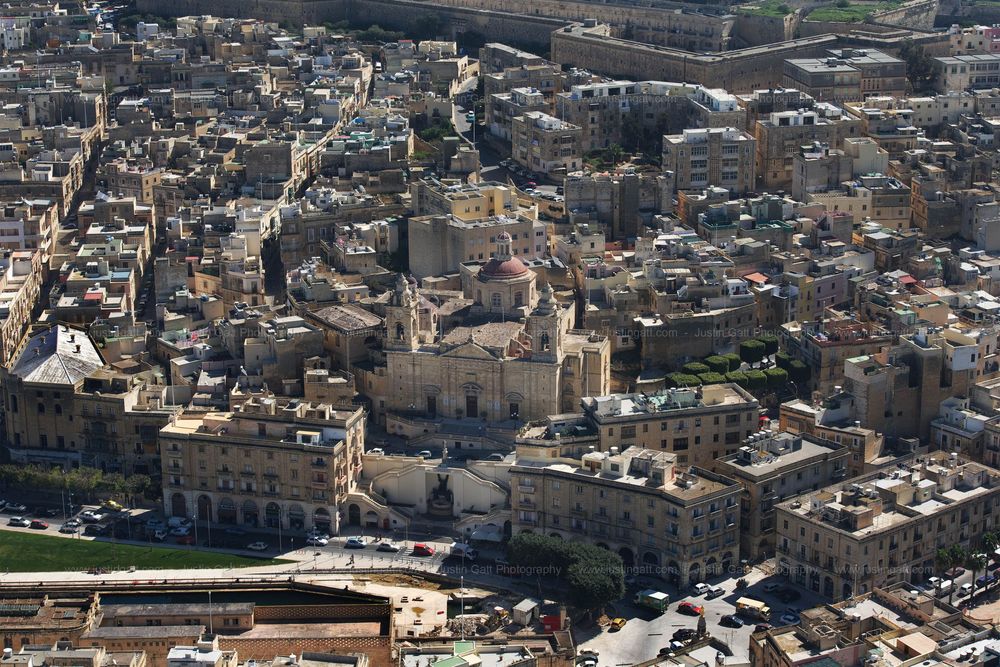 Panoramic cityscape showing dense urban development and historic architecture in Malta.