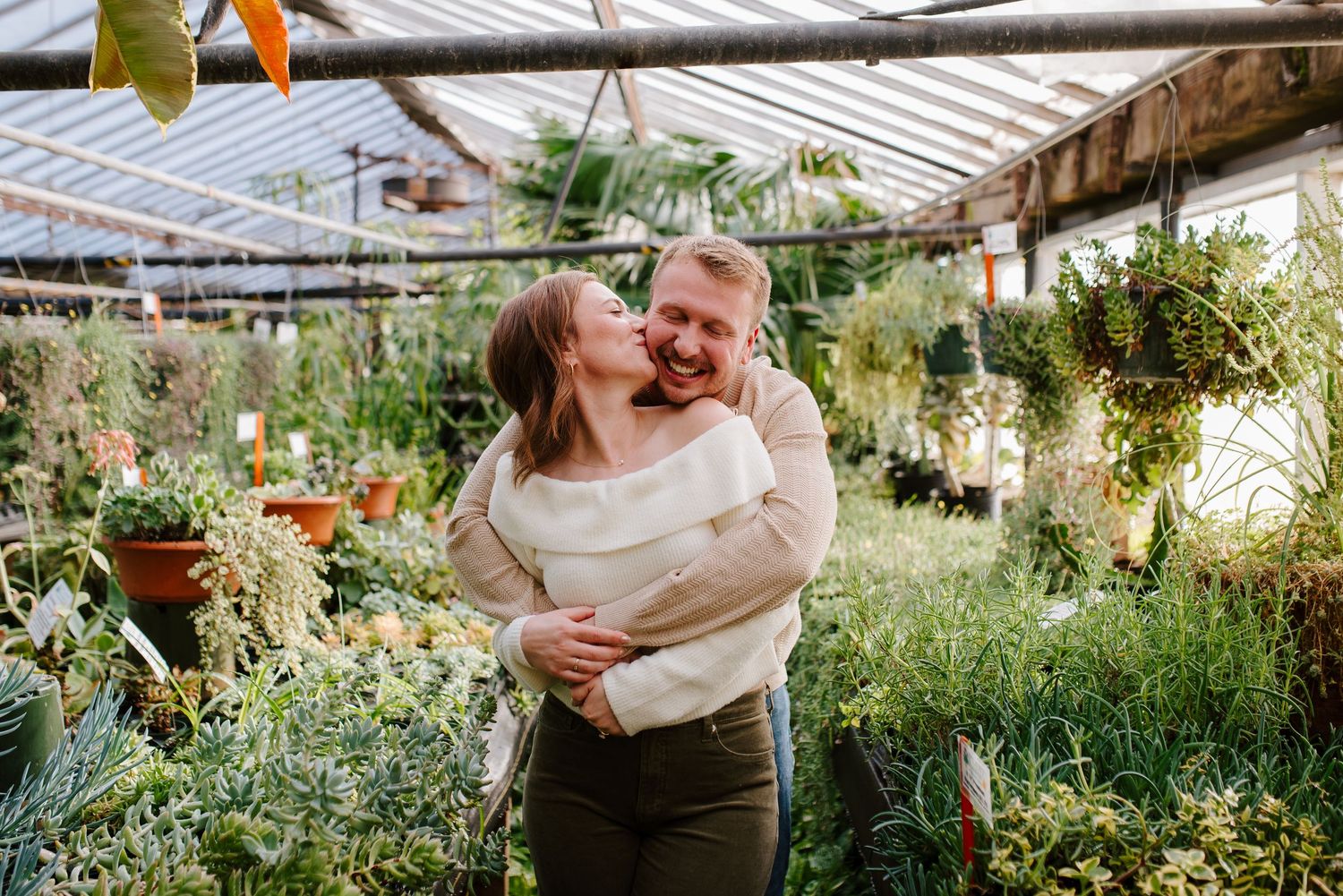 Greenhouse engagement session in Wichita, KS - Plant Kingdom engagement pictures by Jessica Nadine Photography