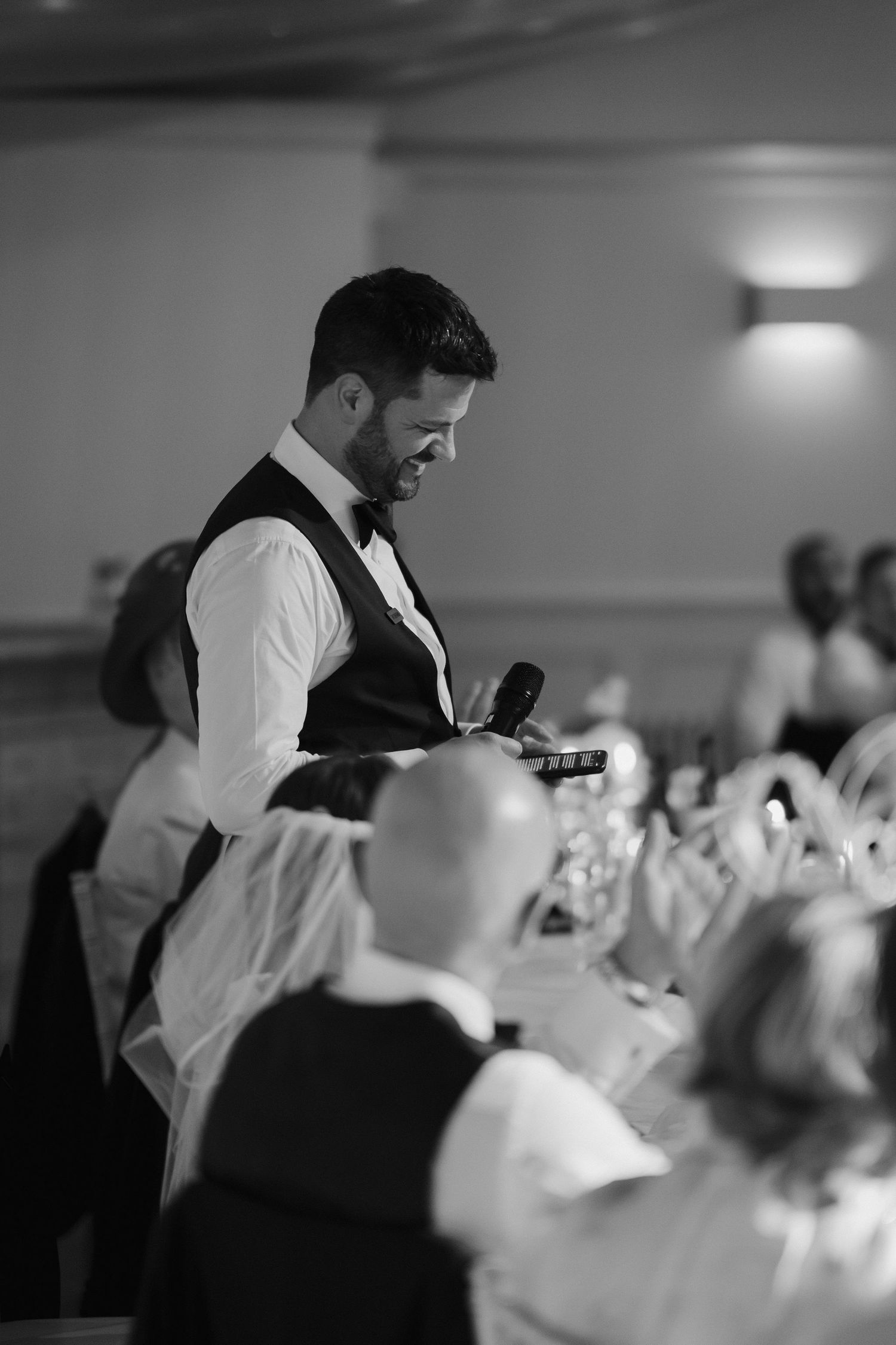 groom smiling giving speech at Iscoyd park