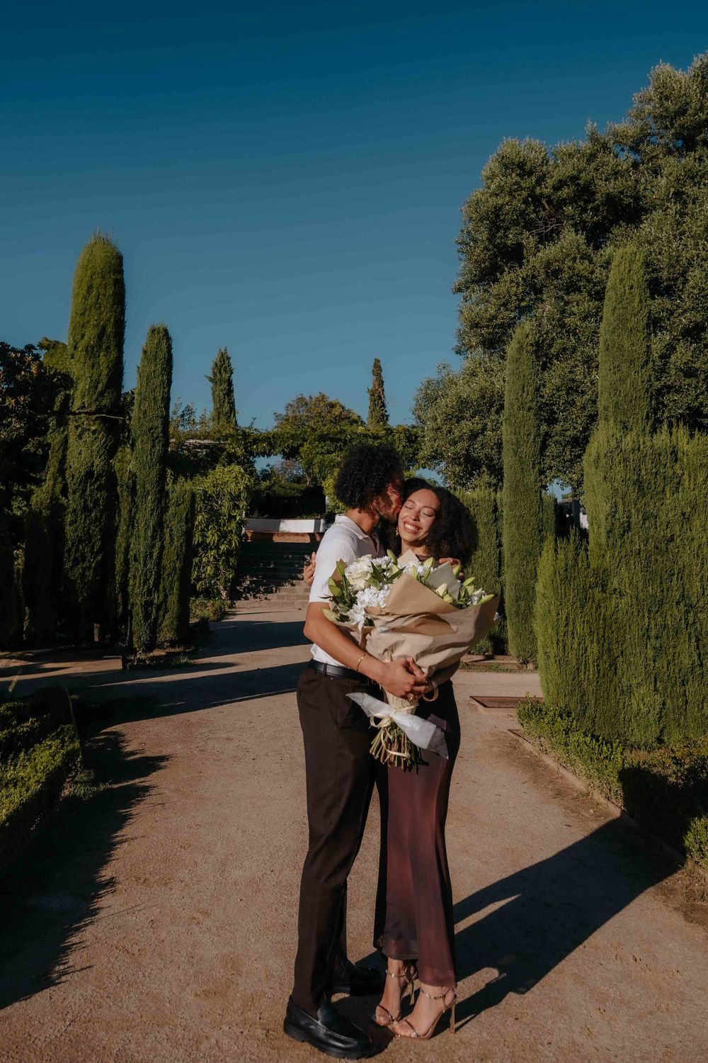 Beautiful floral arrangement held by newly engaged woman.