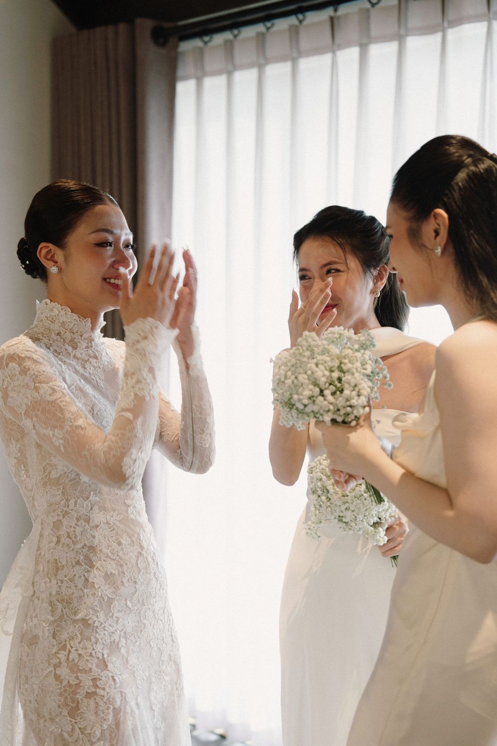 Romantic wedding sequence showing emotional moments with delicate white baby's breath bouquet and lace details.