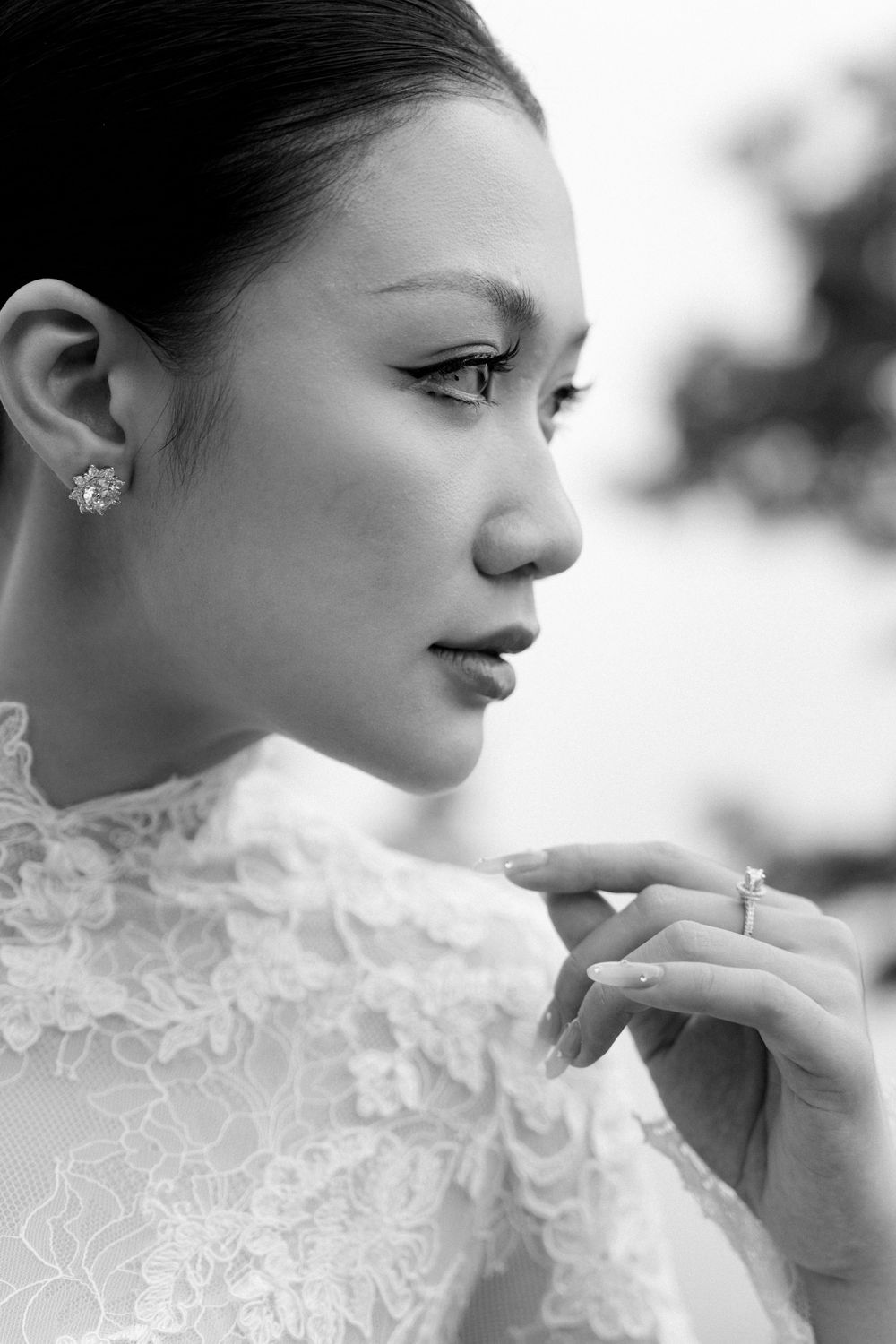 Close-up profile shots showing delicate lace collar detail on white wedding attire.