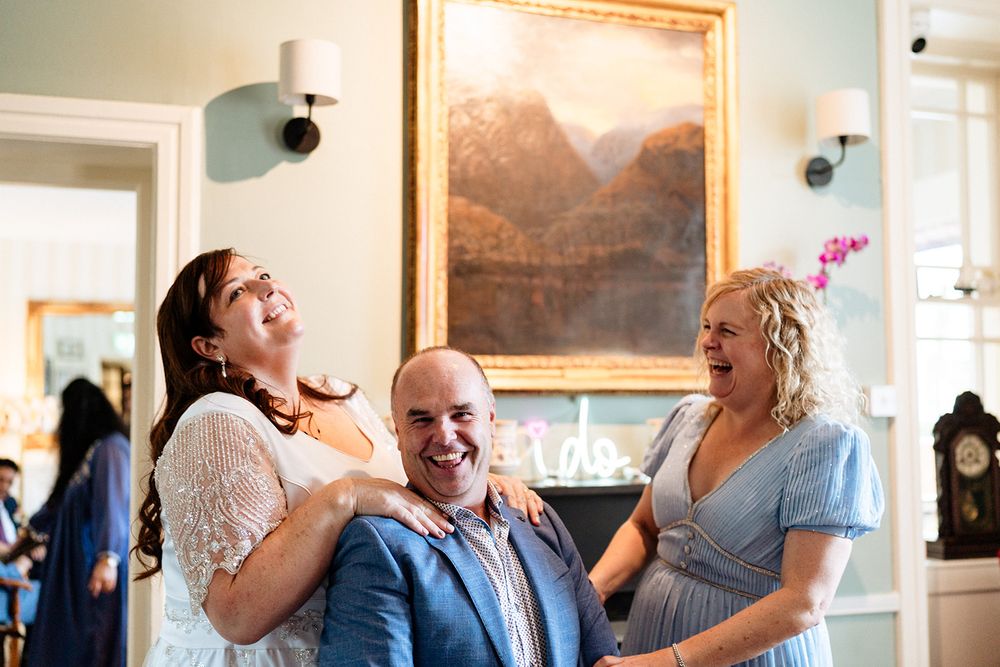 A series of candid emotional moments captured during what appears to be a celebratory indoor gathering.