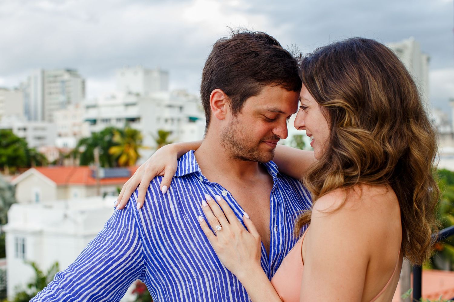 Couples portrait on a rooftop. Marriage proposal. San Juan, Puerto Rico.