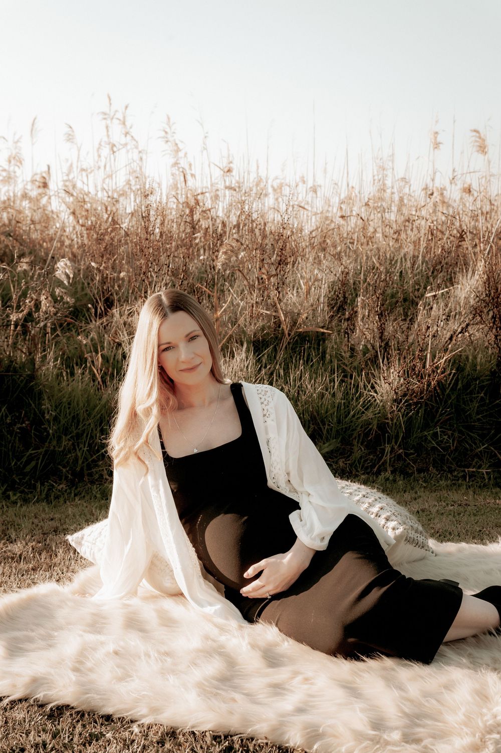 A maternity photo session in a field with golden grass and soft sunlight.
Altona Family Photographer Melbourne