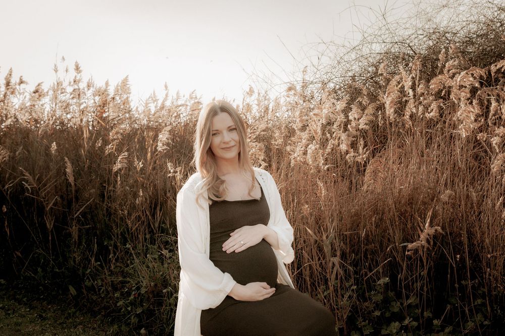 A maternity portrait in a field of dried grass during golden hour.
Altona Family Photographer Melbourne