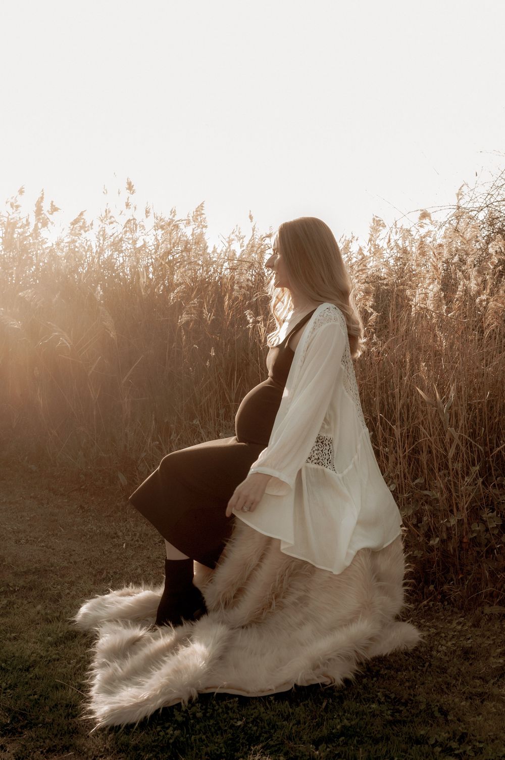 A silhouette maternity portrait against tall grass at sunset.
Altona Family Photographer Melbourne