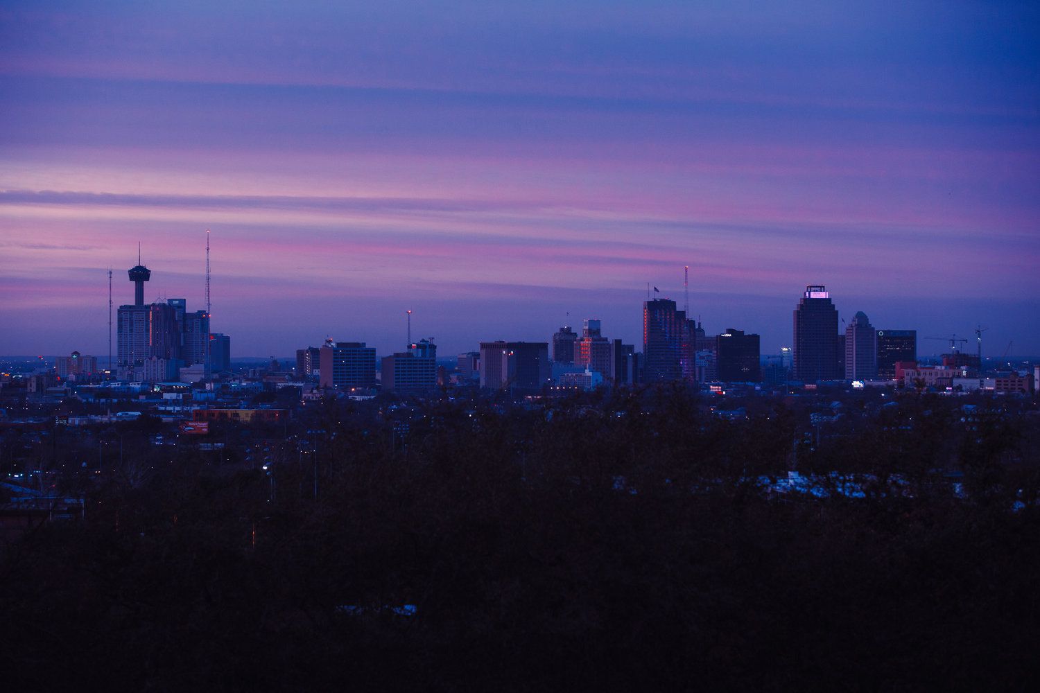 Skyline of San Antonio at dusk with Tower of the Americas visible